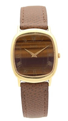 Lot 1176 - AN 18CT GOLD PIAGET "TIGER EYE" MANUAL WIND WRISTWATCH