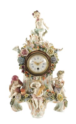Lot 1445 - A 19TH CENTURY GERMAN PORCELAIN MANTEL CLOCK