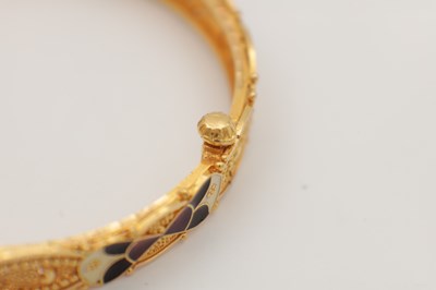 Lot 303 - A 21CT GOLD AND ENAMEL BRACELET