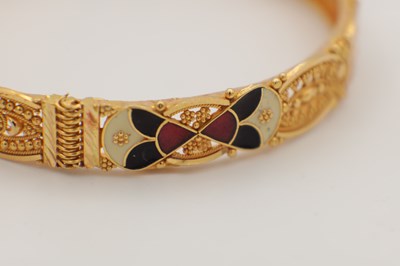 Lot 303 - A 21CT GOLD AND ENAMEL BRACELET