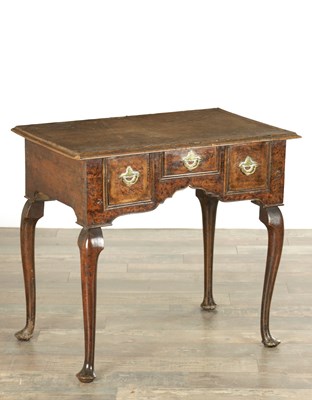 Lot 1559 - AN EARLY 18TH CENTURY BURR ELM LOWBOY