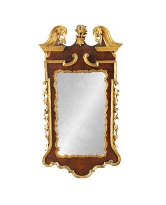 Lot 1635 - A GEORGE II WALNUT AND PARCEL GILT HANGING MIRROR