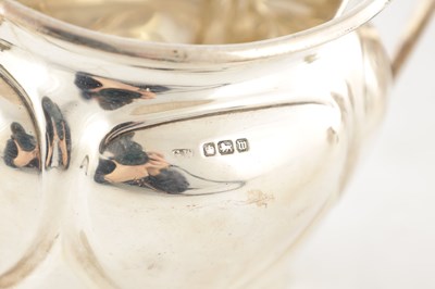 Lot 97 - AN EARLY 20TH CENTURY THREE PIECE TEA SERVICE