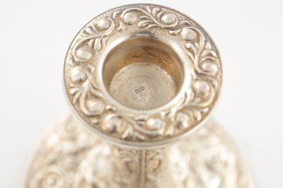 Lot 135 - A PAIR OF 20TH CENTURY SILVER CANDLE STICKS