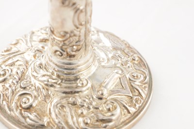Lot 135 - A PAIR OF 20TH CENTURY SILVER CANDLE STICKS