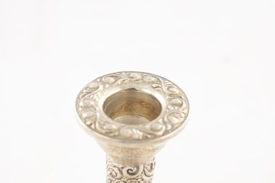 Lot 135 - A PAIR OF 20TH CENTURY SILVER CANDLE STICKS