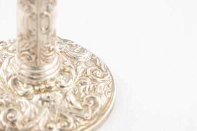 Lot 135 - A PAIR OF 20TH CENTURY SILVER CANDLE STICKS