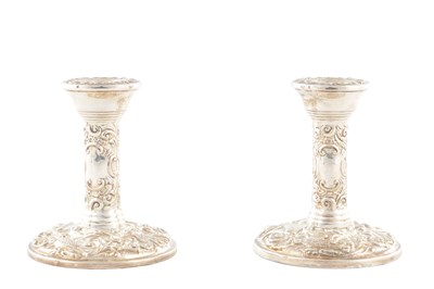 Lot 135 - A PAIR OF 20TH CENTURY SILVER CANDLE STICKS