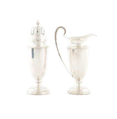 Lot 154 - A 20TH CENTURY SILVER CASED CREAM JUG AND SUGAR CASTER SET