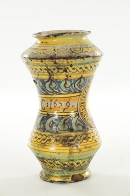 Lot 41 - A SICILIAN MAIOLICA ALBARELLO JAR