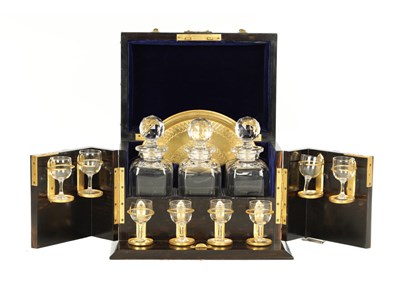 Lot 1005 - A FINE VICTORIAN CALAMANDER AND GIL BRASS MOUNTED SPIRIT TANTALUS LABELLED, BETJEMANN & SONS, LONDON