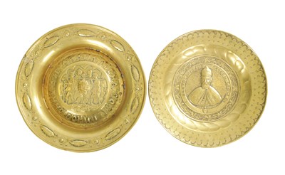Lot 1028 - TWO NUREMBERG BRASS ALMS DISH