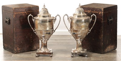 Lot 131 - A LARGE PAIR OF BOXED COUNTRY HOUSE SILVER PLATED TEA URNS