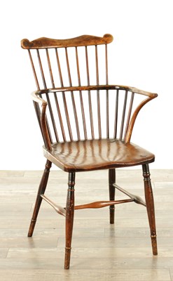 Lot 1562 - AN 18TH CENTURY WINDSOR COMB BACK ARMCHAIR
