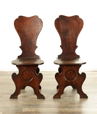 Lot 1514 - A PAIR OF GEORGE II MAHOGANY HALL CHAIRS