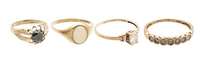 Lot 399 - A COLLECTION OF FOUR 9CT GOLD RINGS