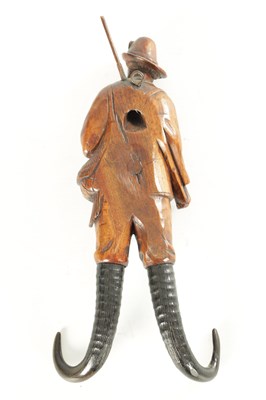 Lot 789 - A 19TH CENTURY BLACK FOREST COAT HOOK