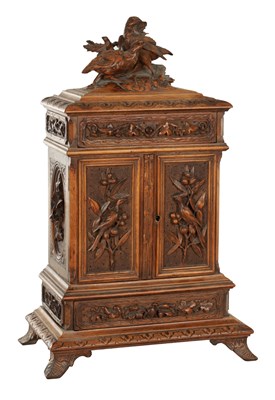 Lot 813 - A 19TH CENTURY BLACK FOREST CARVED WOOD JEWELLERY CABINET