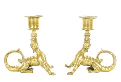 Lot 924 - A PAIR OF 19TH CENTURY BRASS DRAGON-FORM CANDLESTICKS