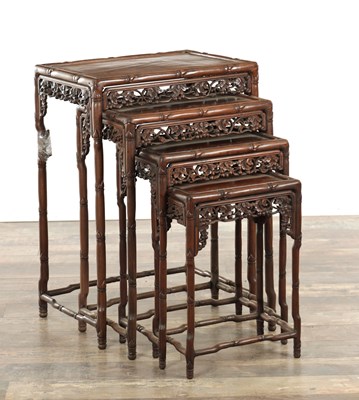 Lot 462 - A GOOD SET OF FOUR 19TH CENTURY HARDWOOD CHINESE NEST OF TABLES