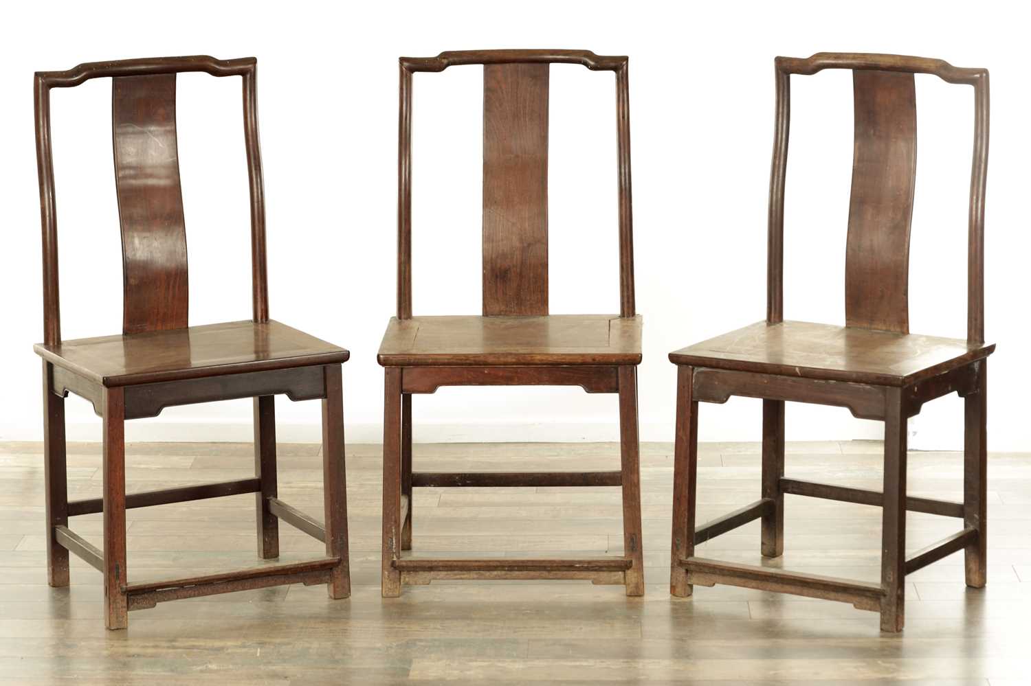 Lot 494 - A SET OF THREE 19TH CENTURY CHINESE HARDWOOD SIDE CHAIRS