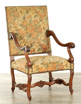 Lot 1630 - A 19TH CENTURY FRENCH CARVED WALNUT AND UPHOLSTERED ARMCHAIR