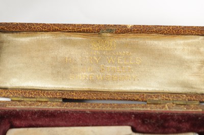 Lot 106 - AN EDWARDIAN CASED MINIATURE SILVER CRICKET BAT