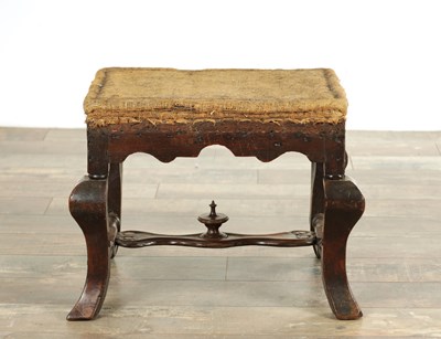 Lot 1513 - A 17TH CENTURY WALNUT UPHOLSTERED STOOL