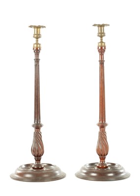 Lot 1145 - A LARGE PAIR OF 19TH CENTURY MAHOGANY AND BRASS CANDLESTICKS