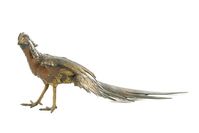 Lot 555 - A JAPANESE MEIJI PERIOD PATINATED AND GILT BRONZE SCULPTURE