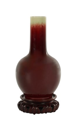 Lot 533 - A CHINESE SANG DE BOEUF OXBLOOD PORCELAIN VASE ON STAND