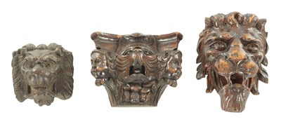 Lot 798 - A COLLECTION OF THREE CARVED LION HEAD MOUNTS