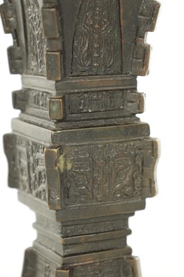 Lot 506 - A 19TH CENTURY CHINESE ARCHAISTIC BRONZE 'GU' VASE