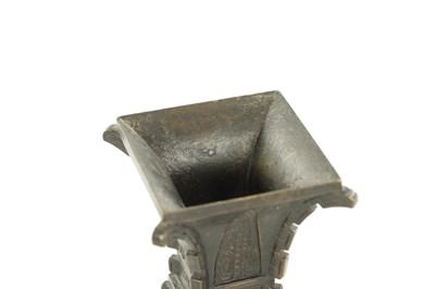 Lot 506 - A 19TH CENTURY CHINESE ARCHAISTIC BRONZE 'GU' VASE