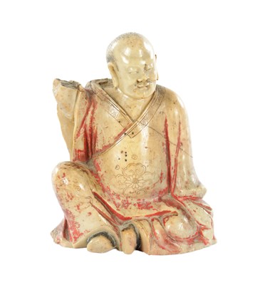 Lot 512 - AN 18TH CENTURY CHINESE SOAPSTONE CARVING OF A LOUHAN