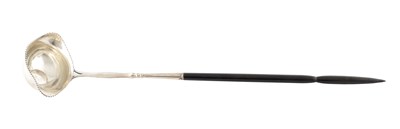 Lot 208 - AN 18TH CENTURY SILVER AND TURNED EBONY HANDLED TODDY LADLE