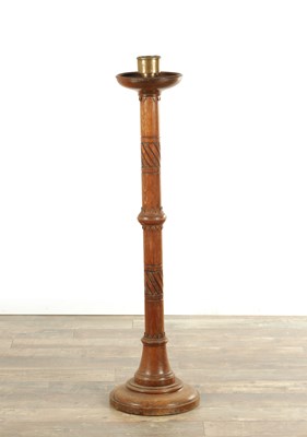 Lot 1515 - A LATE 19TH CENTURY OAK ASTHETIC PERIOD CANDLESTICK