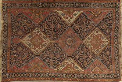 Lot 1131 - AN ANTIQUE TRIBAL QASHQAI RUG