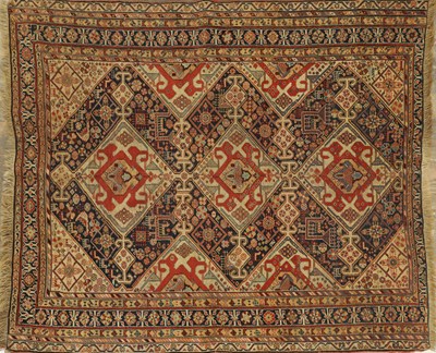 Lot 1130 - AN ANTIQUE TRIBAL QASHQAI RUG