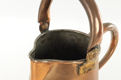 Lot 1122 - A LARGE LATE GEORGIAN SEAMED COPPER ALE JUG