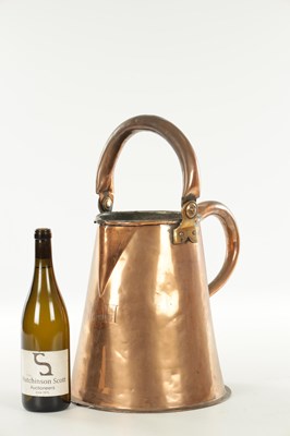 Lot 1122 - A LARGE LATE GEORGIAN SEAMED COPPER ALE JUG