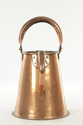 Lot 1122 - A LARGE LATE GEORGIAN SEAMED COPPER ALE JUG