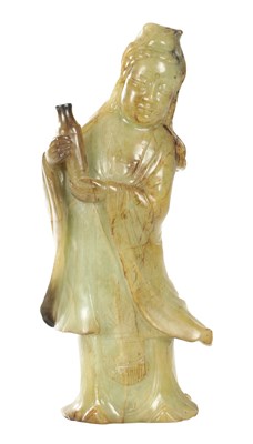 Lot 474 - A LARGE CHINESE CARVED RUSSET JADE FIGURE