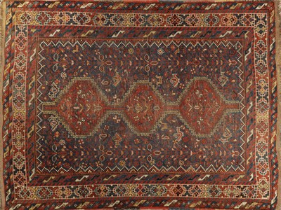Lot 932 - A LATE 19TH CENTURY PERSIAN TRIBAL RUG