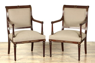Lot 1460 - A PAIR OF LATE 19TH CENTURY FRENCH MAHOGANY AND ORMOLU MOUNTED UPHOLSTERED ARMCHAIRS