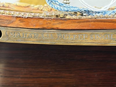 Lot 1108 - A FINE 19TH CENTURY INLAID KINGWOOD AND OROMLU MOUNTED SERPENTINE SHAPED DECANTER BOX