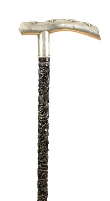 Lot 857 - A CHINESE SILVER HANDLED WALKING STICK