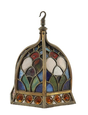 Lot 921 - A LATE 19TH CENTURY BRASS AND LEADED STAINED GLASS HANGING HALL LANTERN