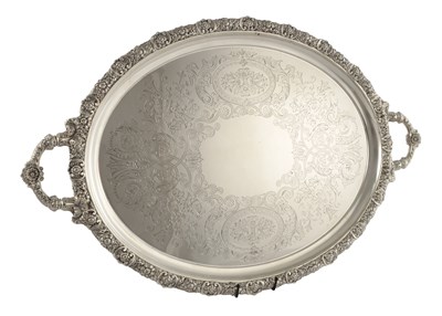 Lot 140 - A LARGE LATE 19TH CENTURY OVAL SILVER TWIN HANDLED TRAY