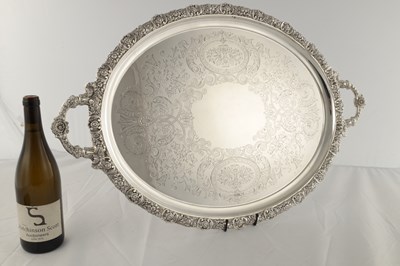 Lot 140 - A LARGE LATE 19TH CENTURY OVAL SILVER TWIN HANDLED TRAY